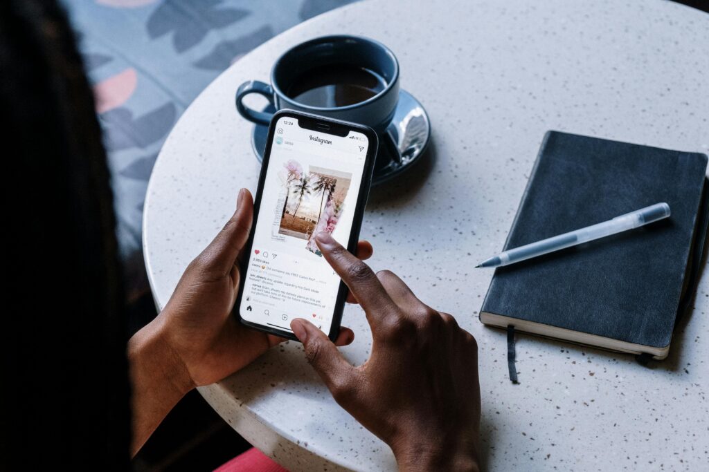 pexels-photo-5053851-5053851 Person Holding White Printer Paper Near Black Ceramic Mug With Coffee